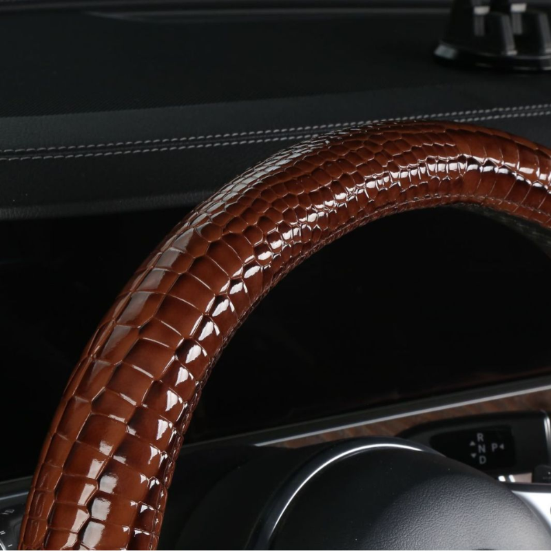 Bọc vô lăng giả da cá sấu sang trọng, êm ái cho xe hơi