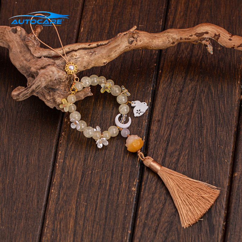 Khánh treo xe ô tô tua rua phong thủy hoa sen thỏ ngọc